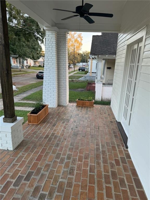 view of patio / terrace with a porch and ceiling fan