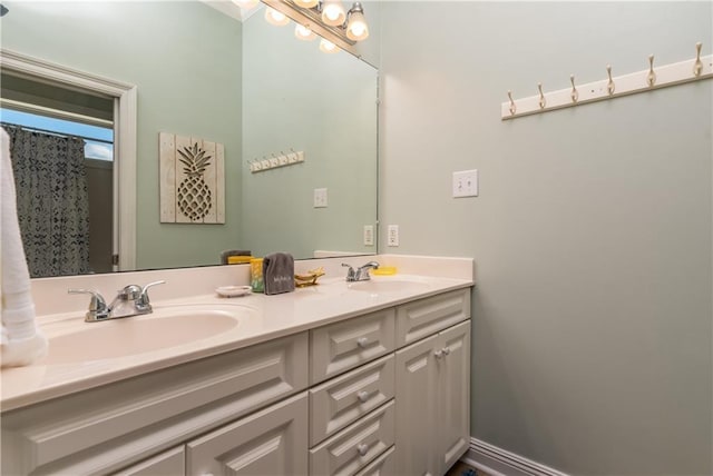 106 Serigny Ct, Dauphin Island, AL 36528 - bathroom featuring double vanity