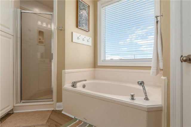 106 Serigny Ct, Dauphin Island, AL 36528 - bathroom with a stall shower and a bath