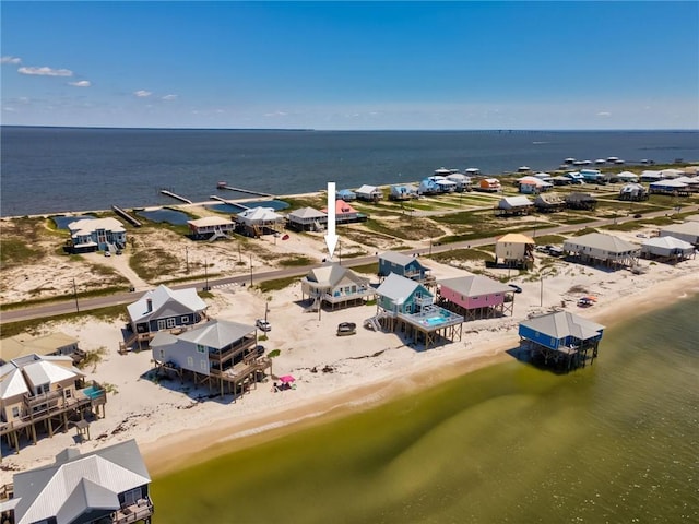 106 Serigny Ct, Dauphin Island, AL 36528 - aerial perspective of suburban area with extended coastline