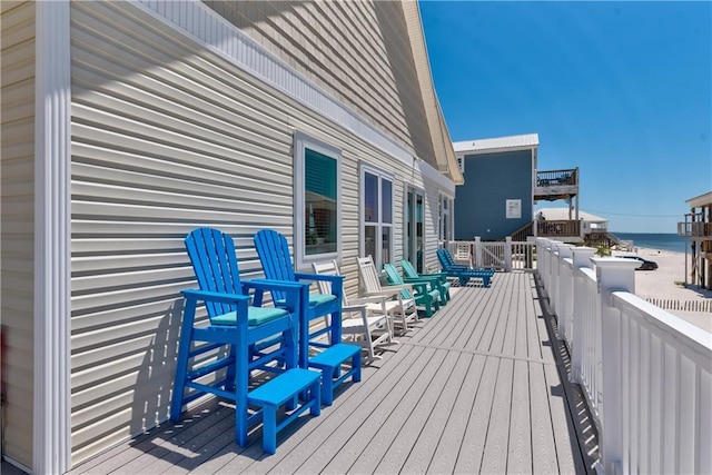 106 Serigny Ct, Dauphin Island, AL 36528 - wooden terrace with a water view