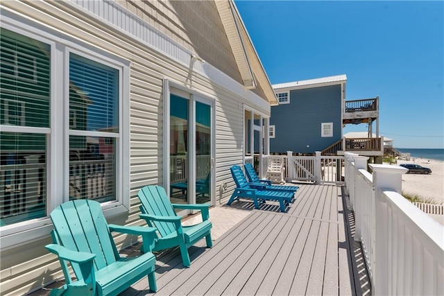 106 Serigny Ct, Dauphin Island, AL 36528 - wooden terrace with a water view