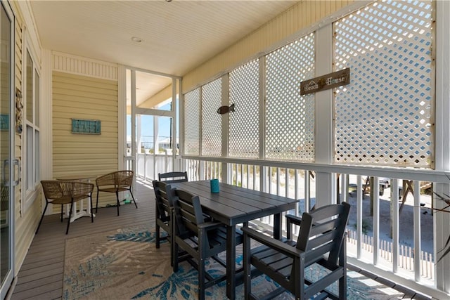 106 Serigny Ct, Dauphin Island, AL 36528 - sunroom / solarium with outdoor dining area