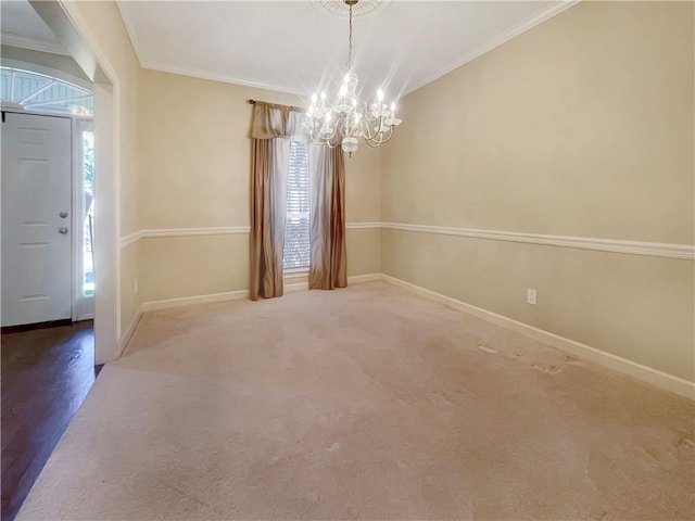 interior space with carpet floors, crown molding, and a chandelier