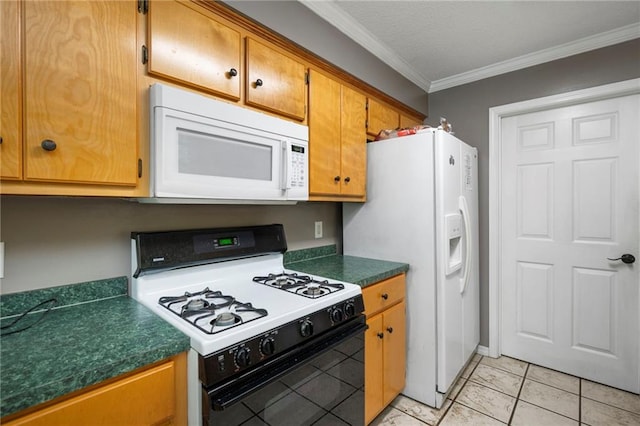 kitchen with white appliances, ornamental molding, and light tile patterned floors