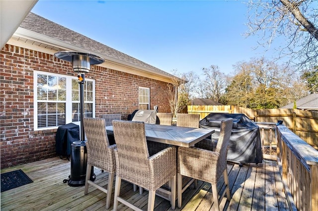 wooden terrace with grilling area