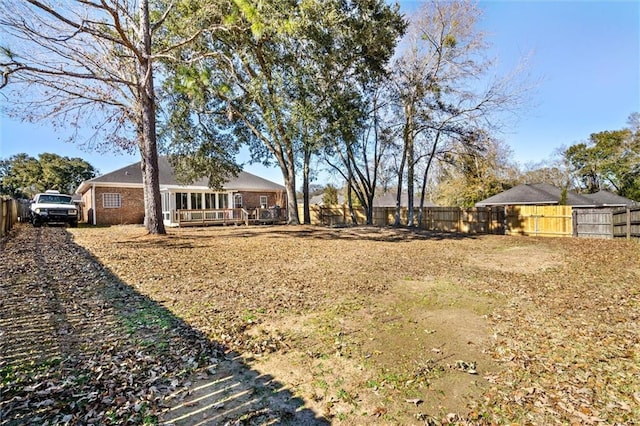 view of yard featuring a deck