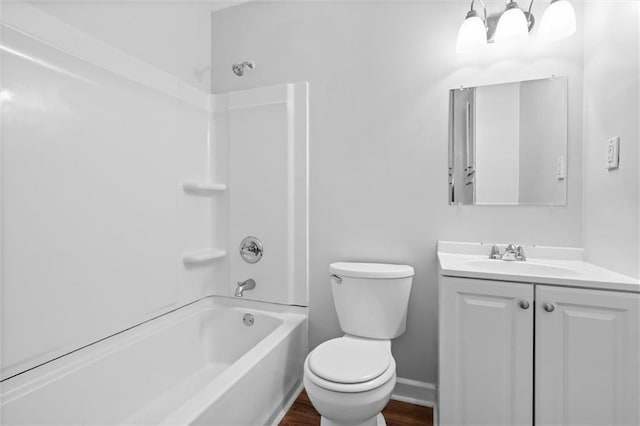 full bathroom featuring toilet, shower / bathing tub combination, vanity, and wood-type flooring