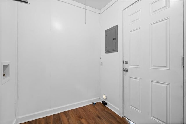 laundry area featuring dark hardwood / wood-style floors, electric panel, and washer hookup