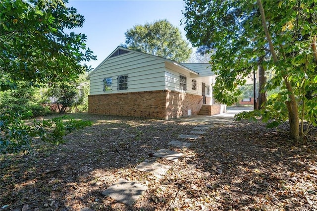 4010 Cresthaven Rd, Mobile, AL 36609 - view of side of home with brick siding