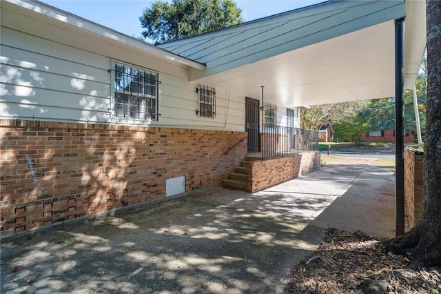 4010 Cresthaven Rd, Mobile, AL 36609 - view of patio / terrace featuring an attached carport