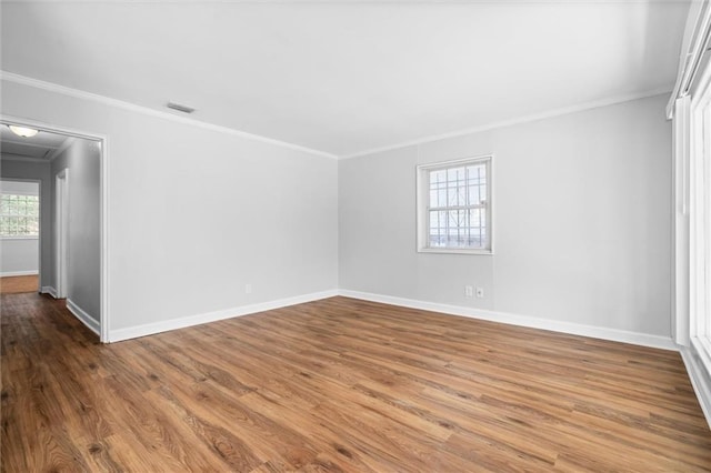 4010 Cresthaven Rd, Mobile, AL 36609 - spare room featuring ornamental molding, baseboards, and wood finished floors