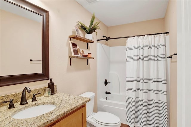 full bathroom with vanity, shower / bath combination with curtain, and toilet