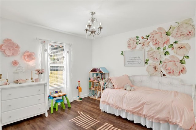 bedroom featuring a chandelier and dark hardwood / wood-style floors