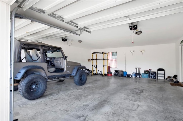 garage featuring a garage door opener