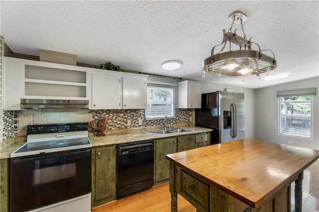 3628 Jarvis Ln, Semmes, AL 36575 - kitchen featuring black dishwasher, electric stove, stainless steel fridge with ice dispenser, a sink, and under cabinet range hood