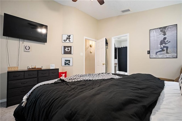 bedroom with light carpet, lofted ceiling, ceiling fan, and baseboards