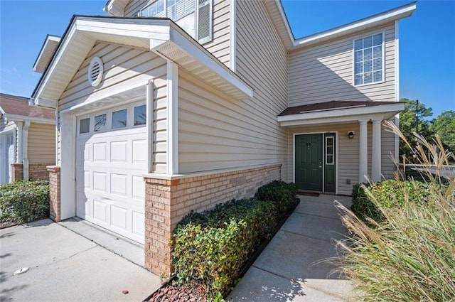 property entrance featuring a garage