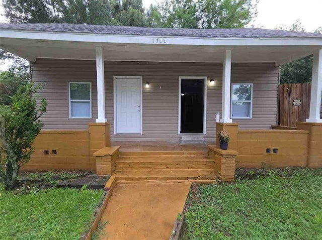 1105 Adams St, Mobile, AL 36603 - view of front of property with a porch, crawl space, and a shingled roof