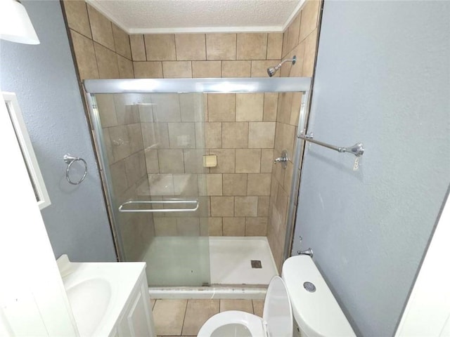 1105 Adams St, Mobile, AL 36603 - full bathroom featuring a stall shower, vanity, a textured ceiling, and a textured wall