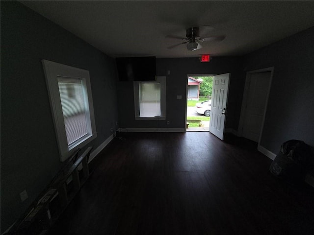 1105 Adams St, Mobile, AL 36603 - empty room featuring a ceiling fan and dark wood-style flooring