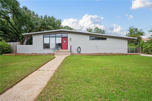 5554 Racine Ave, Mobile, AL 36618 - mid-century modern home with brick siding