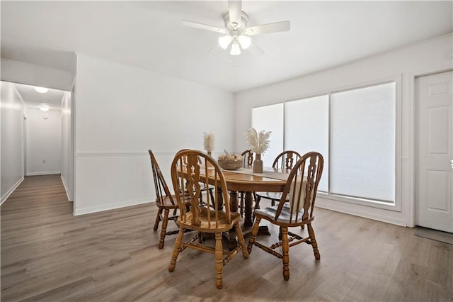 5554 Racine Ave, Mobile, AL 36618 - dining room with light wood finished floors and ceiling fan
