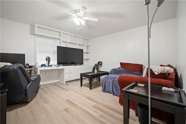 5554 Racine Ave, Mobile, AL 36618 - living area with an office area, ceiling fan, light wood-style floors, and a textured ceiling