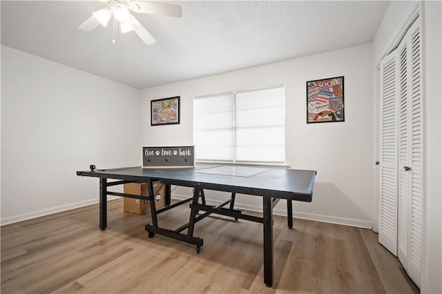 5554 Racine Ave, Mobile, AL 36618 - game room with light wood finished floors and ceiling fan