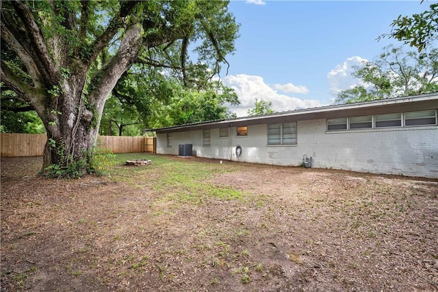 5554 Racine Ave, Mobile, AL 36618 - back of property with a fenced backyard and brick siding