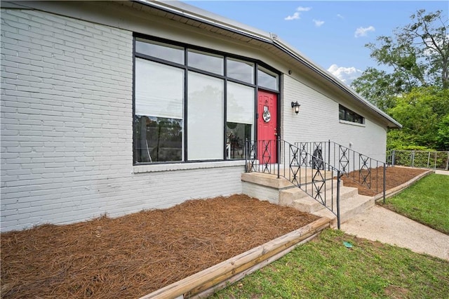 5554 Racine Ave, Mobile, AL 36618 - doorway to property with brick siding
