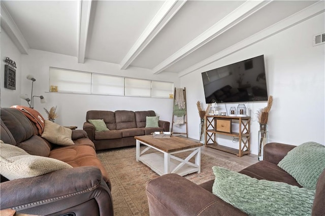 5554 Racine Ave, Mobile, AL 36618 - living area featuring beamed ceiling and wood finished floors