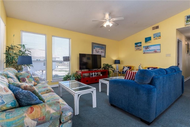 living room featuring visible vents, carpet flooring, a ceiling fan, and vaulted ceiling