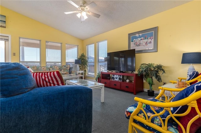 living area featuring carpet flooring, ceiling fan, a textured ceiling, and lofted ceiling