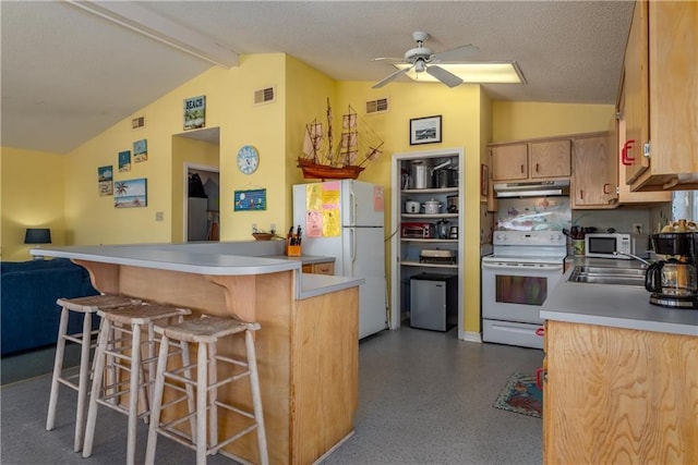 kitchen with under cabinet range hood, visible vents, white appliances, and lofted ceiling with beams