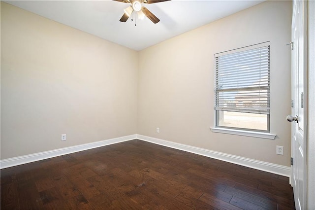 unfurnished room featuring baseboards, ceiling fan, and dark wood-style flooring