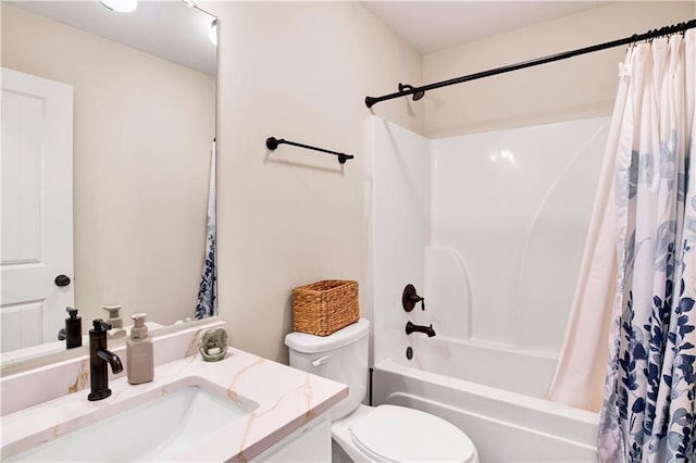 bathroom featuring vanity, shower / bath combination with curtain, and toilet