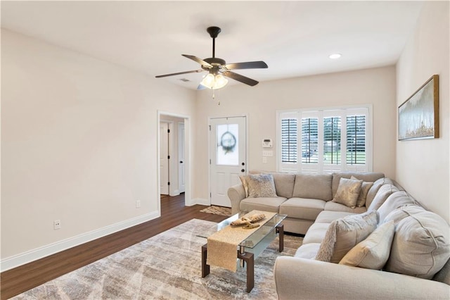 living room with dark wood-style floors, recessed lighting, ceiling fan, and baseboards