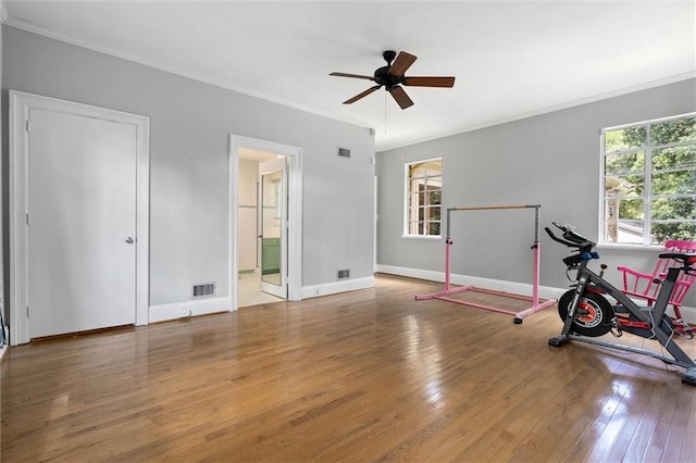 2007 Levert Dr N, Mobile, AL 36607 - workout area with ornamental molding, wood-type flooring, a ceiling fan, and baseboards