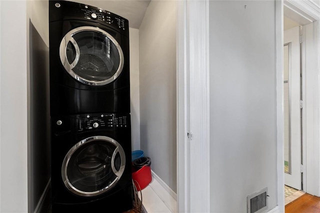 2007 Levert Dr N, Mobile, AL 36607 - laundry room featuring stacked washing machine and dryer