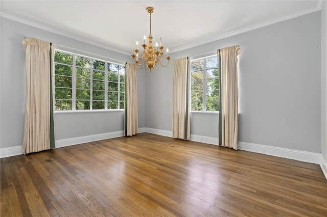 2007 Levert Dr N, Mobile, AL 36607 - unfurnished room featuring a chandelier, ornamental molding, baseboards, and wood finished floors