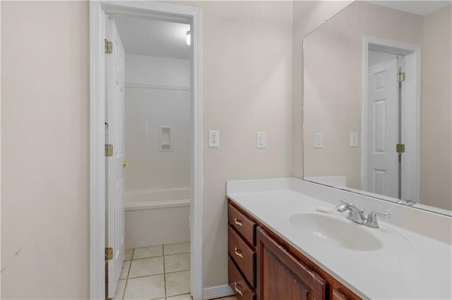 full bath with vanity and tile patterned flooring