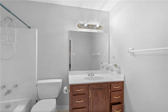 full bath featuring toilet, vanity, and shower / washtub combination