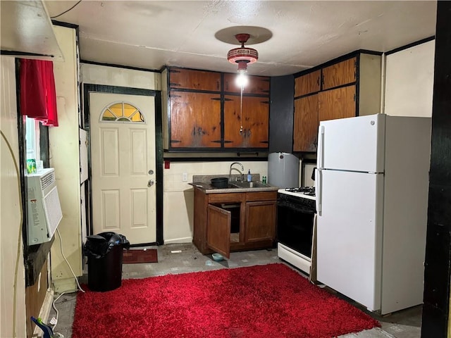 kitchen featuring sink and white appliances