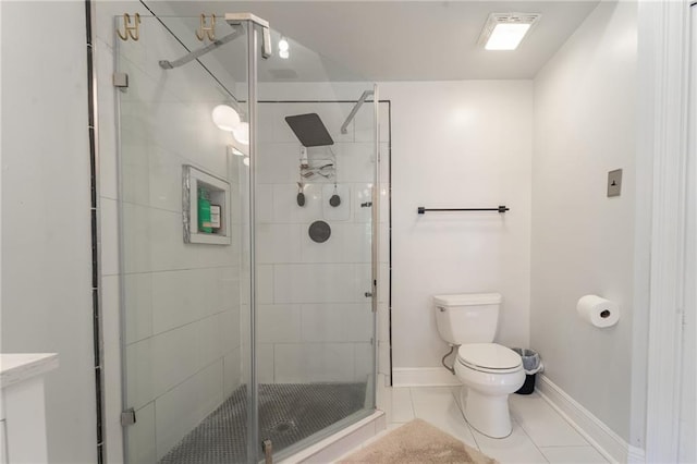 full bath with a stall shower, baseboards, and toilet
