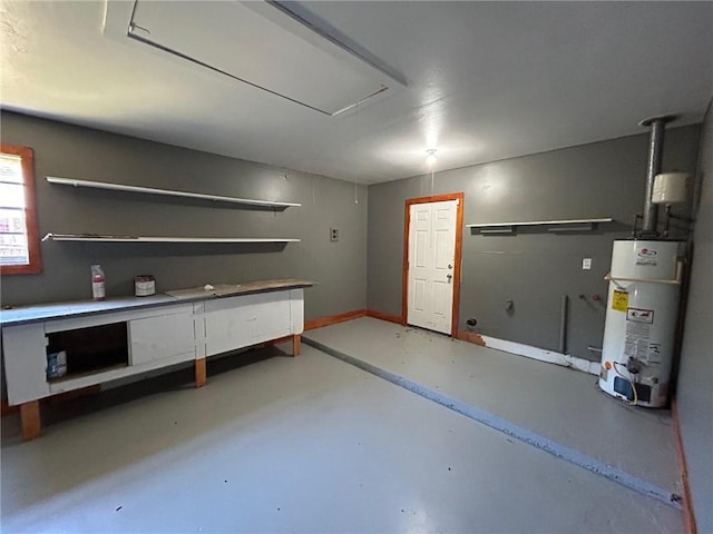 interior space featuring baseboards and gas water heater