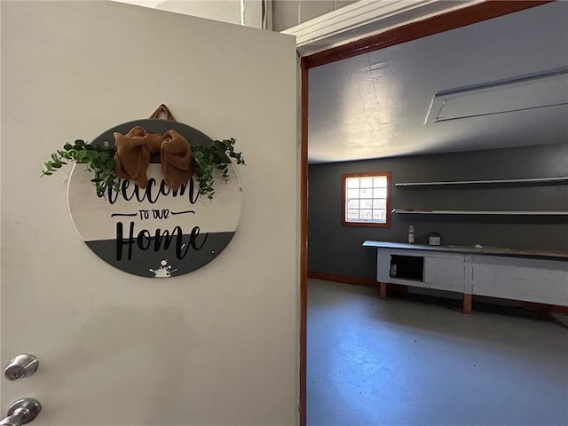 room details with concrete floors and baseboards