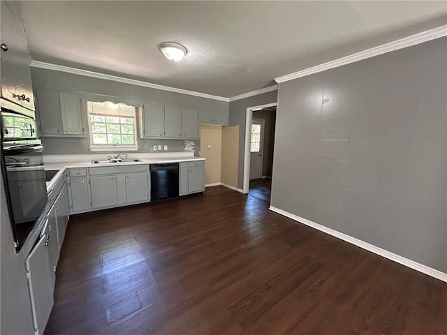 kitchen featuring black dishwasher, oven, crown molding, dark wood-type flooring, and light countertops