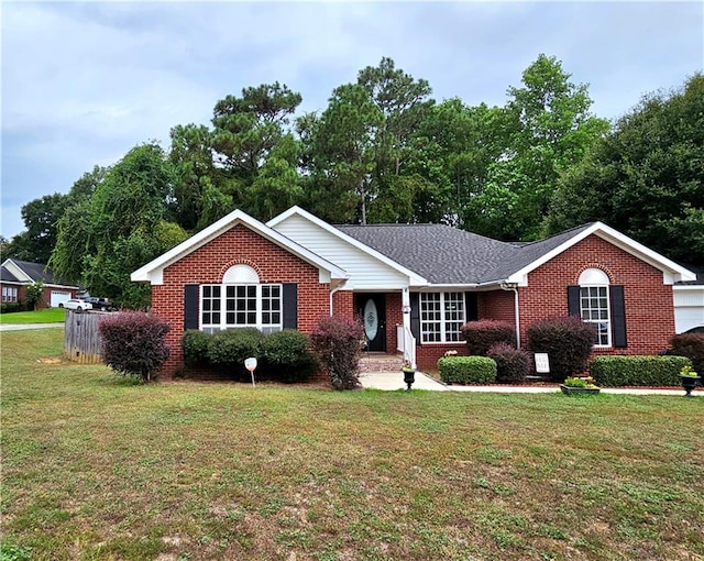 ranch-style house with a front yard