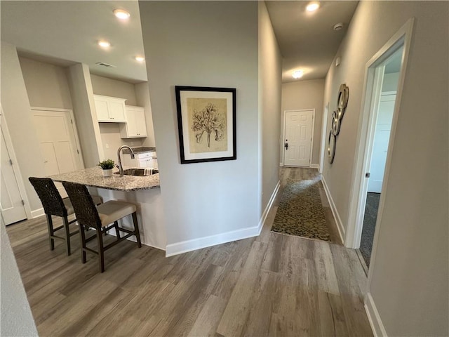 9310 Ofallon Dr N, Mobile, AL 36595 - corridor with dark wood-style flooring and recessed lighting